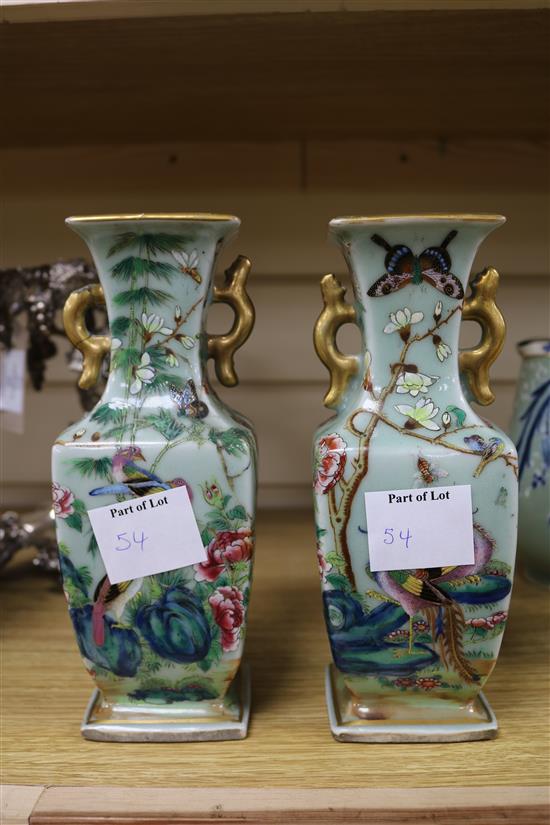 Two famille verte vases, two blue and white Chinese vases, a dish and a carved stand